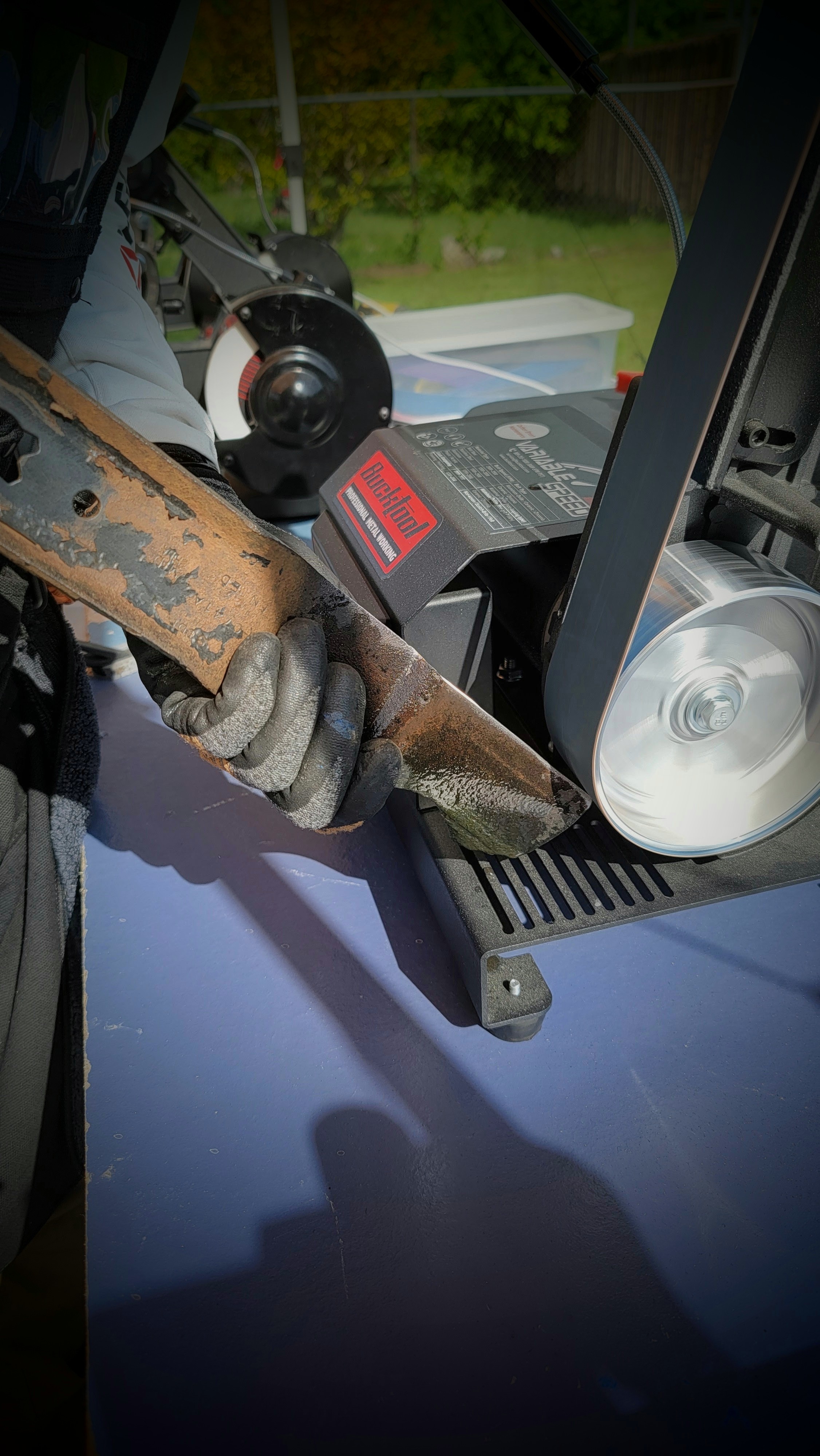 Mower blade sharpening on the Bucktool 2x42